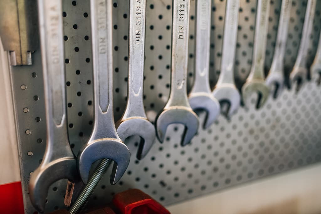 Wrenches sorted by size in a car mechanic's workshop